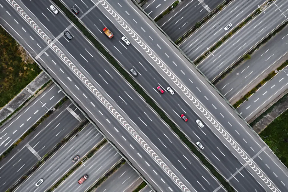 Overhead view of multilane elevated highway with multiple levels.